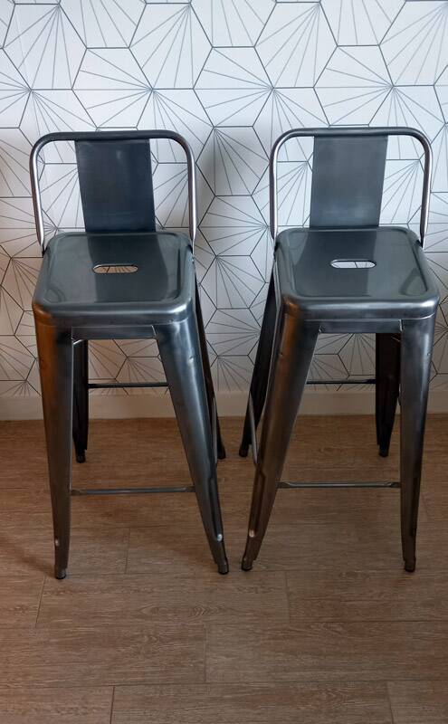 Pair of tolix hpd 75 stools – in varnished raw steel.