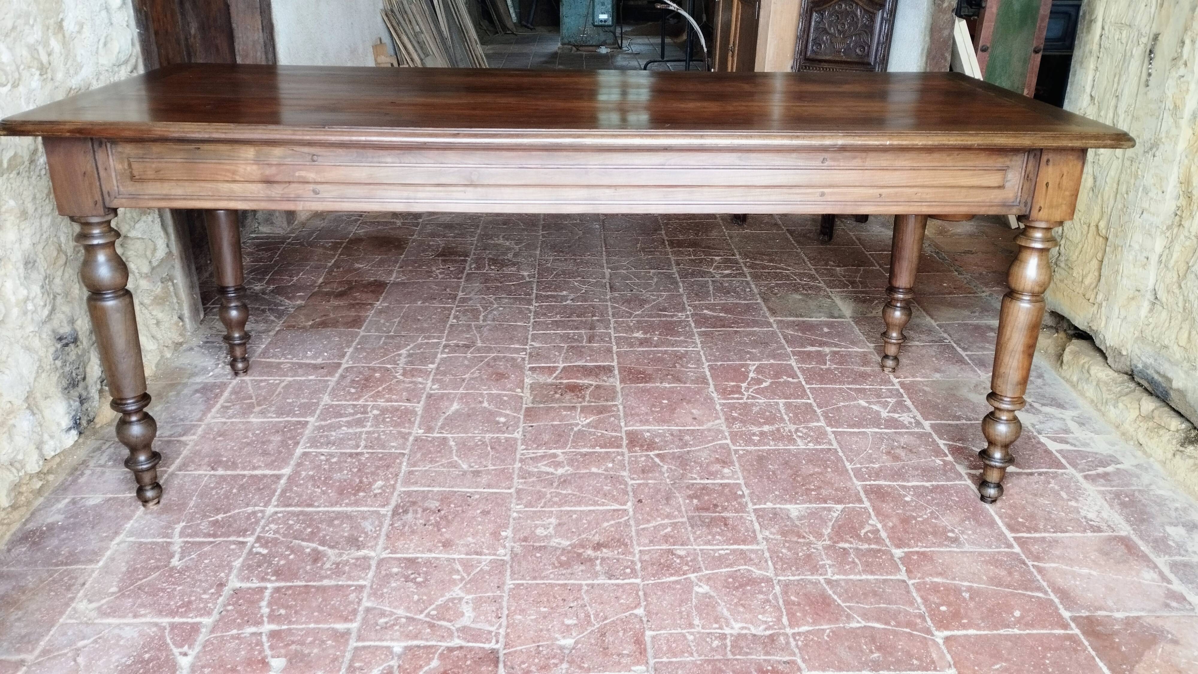 Old French farmhouse table in walnut, turned legs, waxed finish