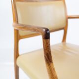 Pair of N.O. Moeller armchairs, model 65, in rosewood and light leather