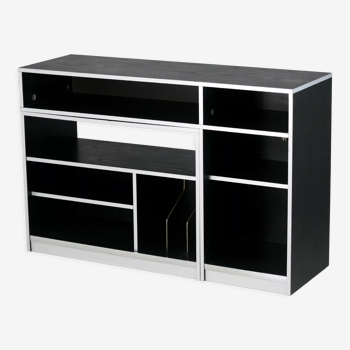 Storage cabinet wood compressed lacquered black lining margins aluminum. France, circa 1975.