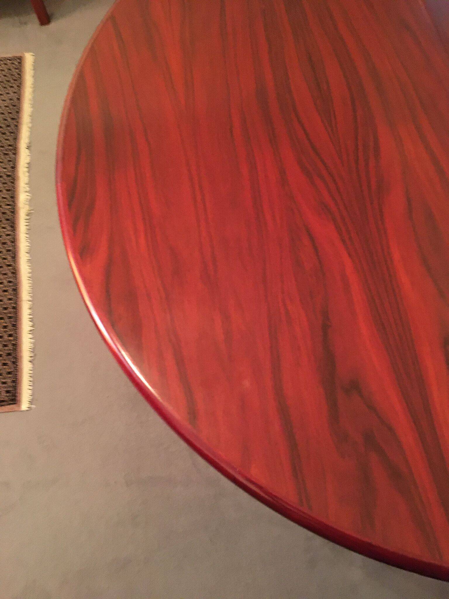 Round rosewood table with central leg, Scandinavian design møllers møbelfabrik