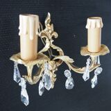 Pair of gilded bronze sconces and crystal pendants