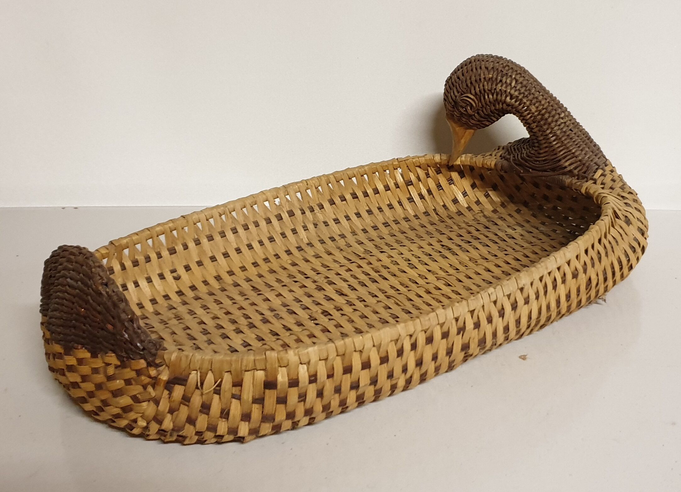 Ancient wicker duck basket