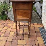 Wooden bedside table with marble top