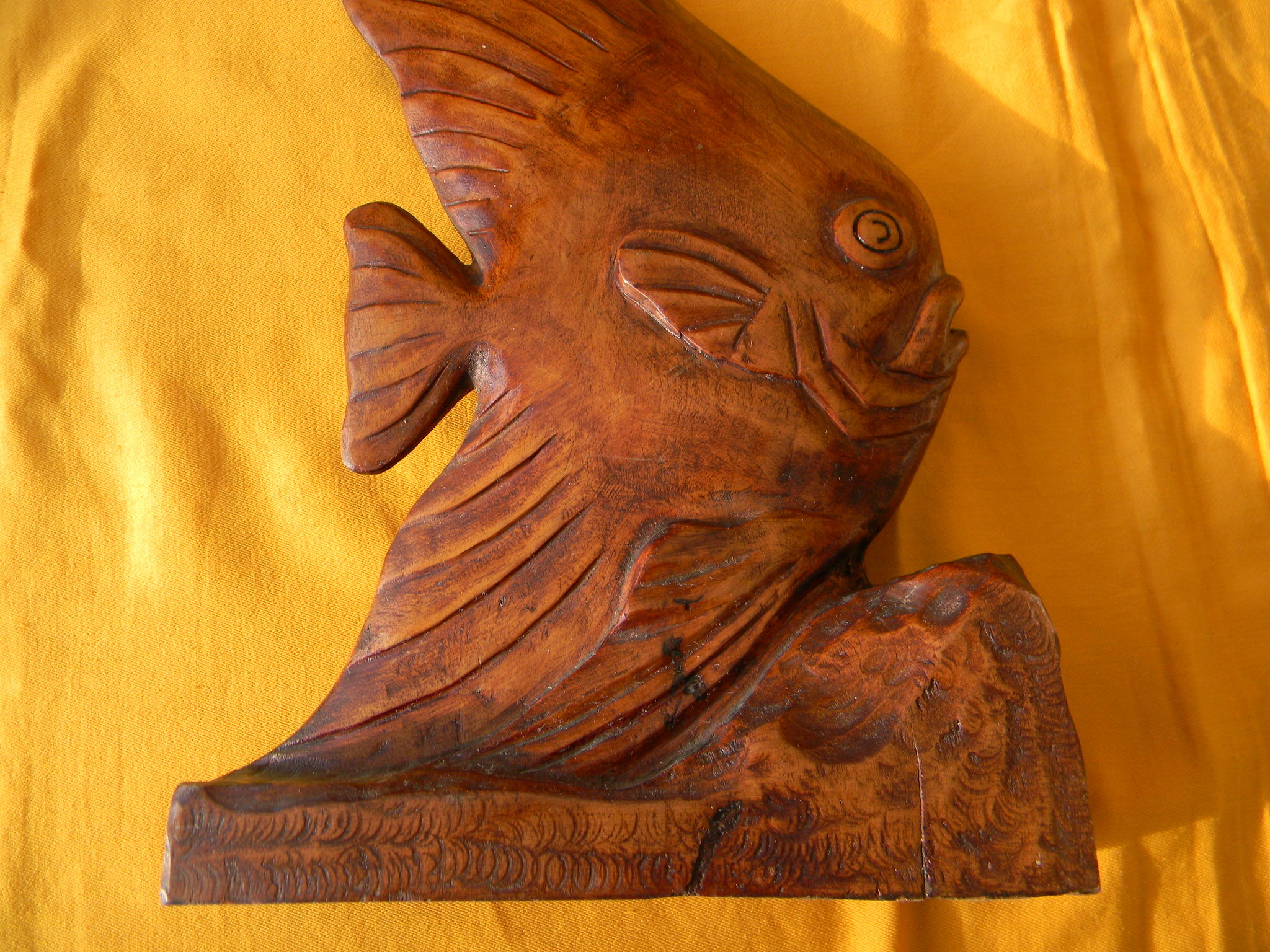 Wooden sculpture representing a langeac fish