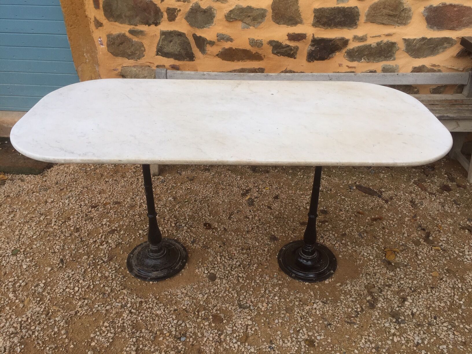 Marble and double base bistro table