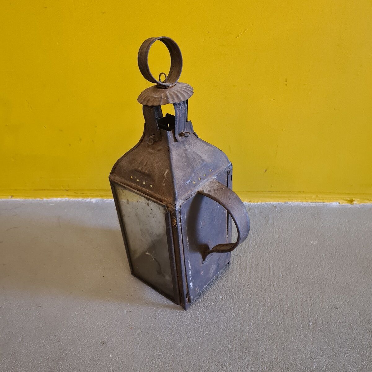 Antique french metal walking candle lantern. from around 1900.
