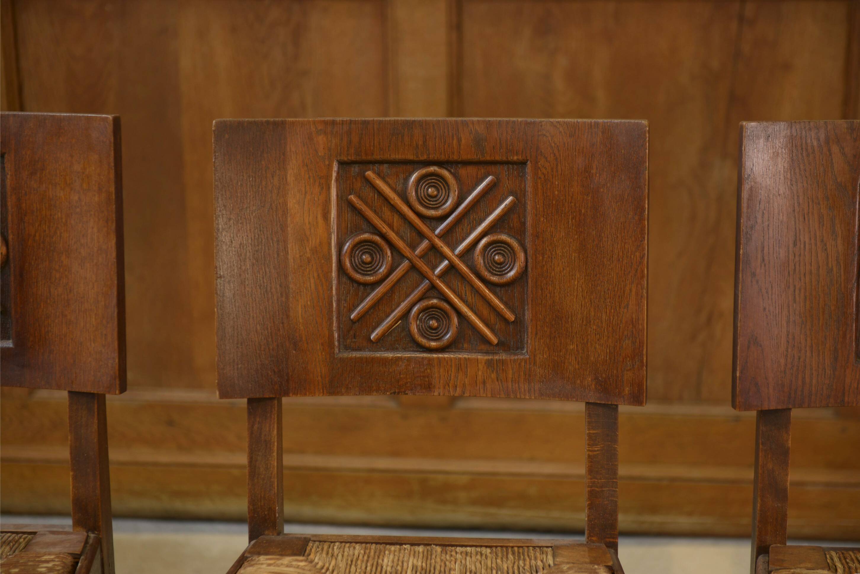 Ensemble de 6 chaises Charles Dudouyt en chêne 1950’s