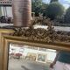 Large antique gilded mirror with carved pediment, 126 cm