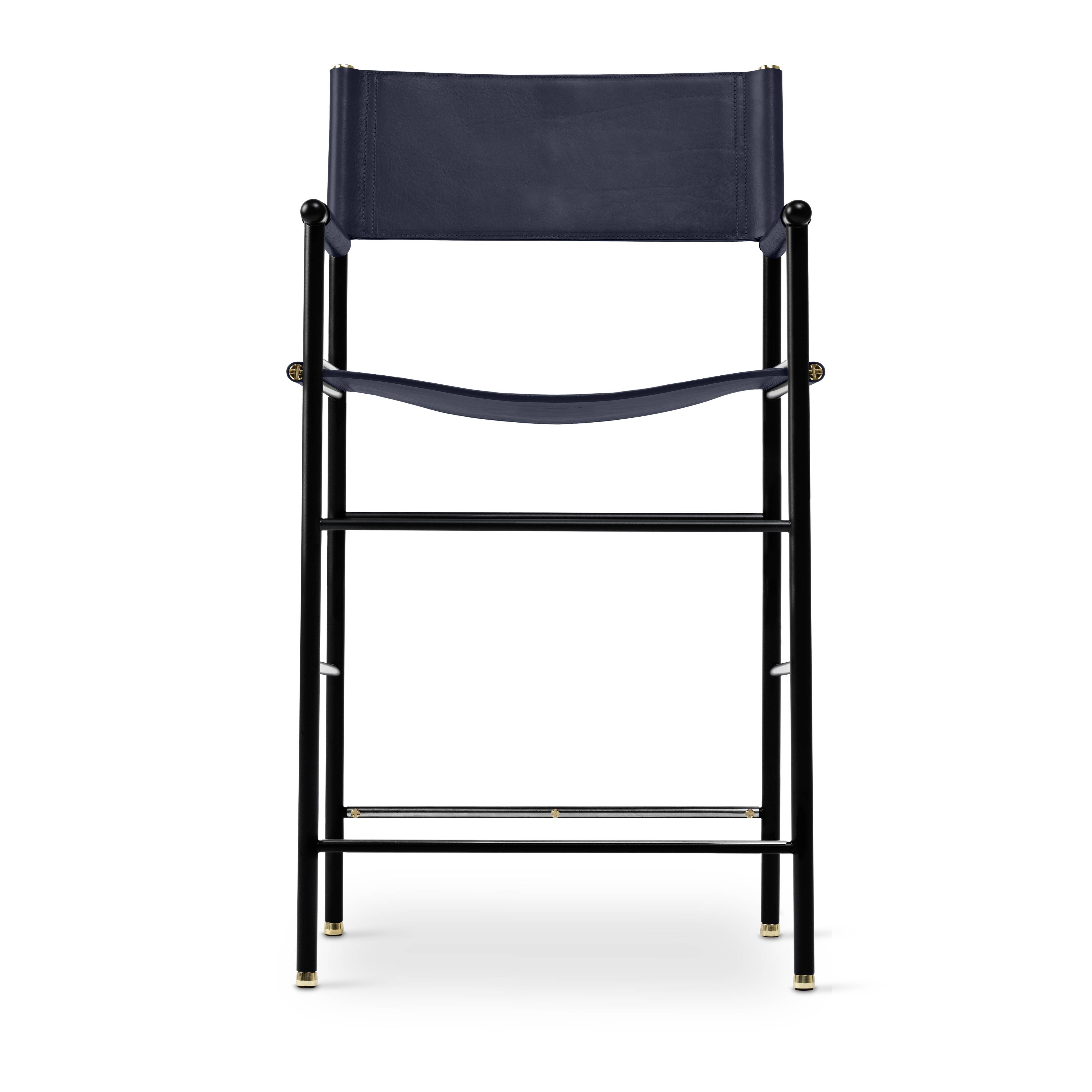 A pair of bar stools with a navy blue leather backrest and black rubber.
