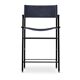 A pair of bar stools with a navy blue leather backrest and black rubber.