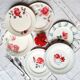 Old mismatched earthenware dinner plates