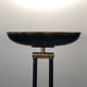 Black lacquered metal floor lamp with brass.