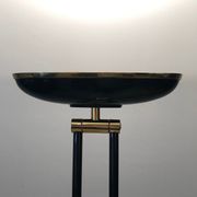 Black lacquered metal floor lamp with brass.