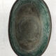 Old brass planter with brown patina