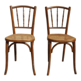 2 bistro chairs seated tanned