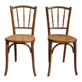 2 bistro chairs seated tanned