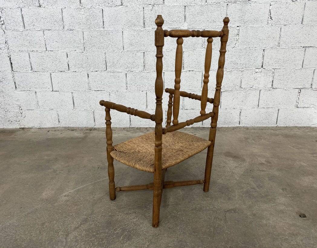 Straw and turned wood armchair