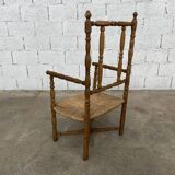 Straw and turned wood armchair