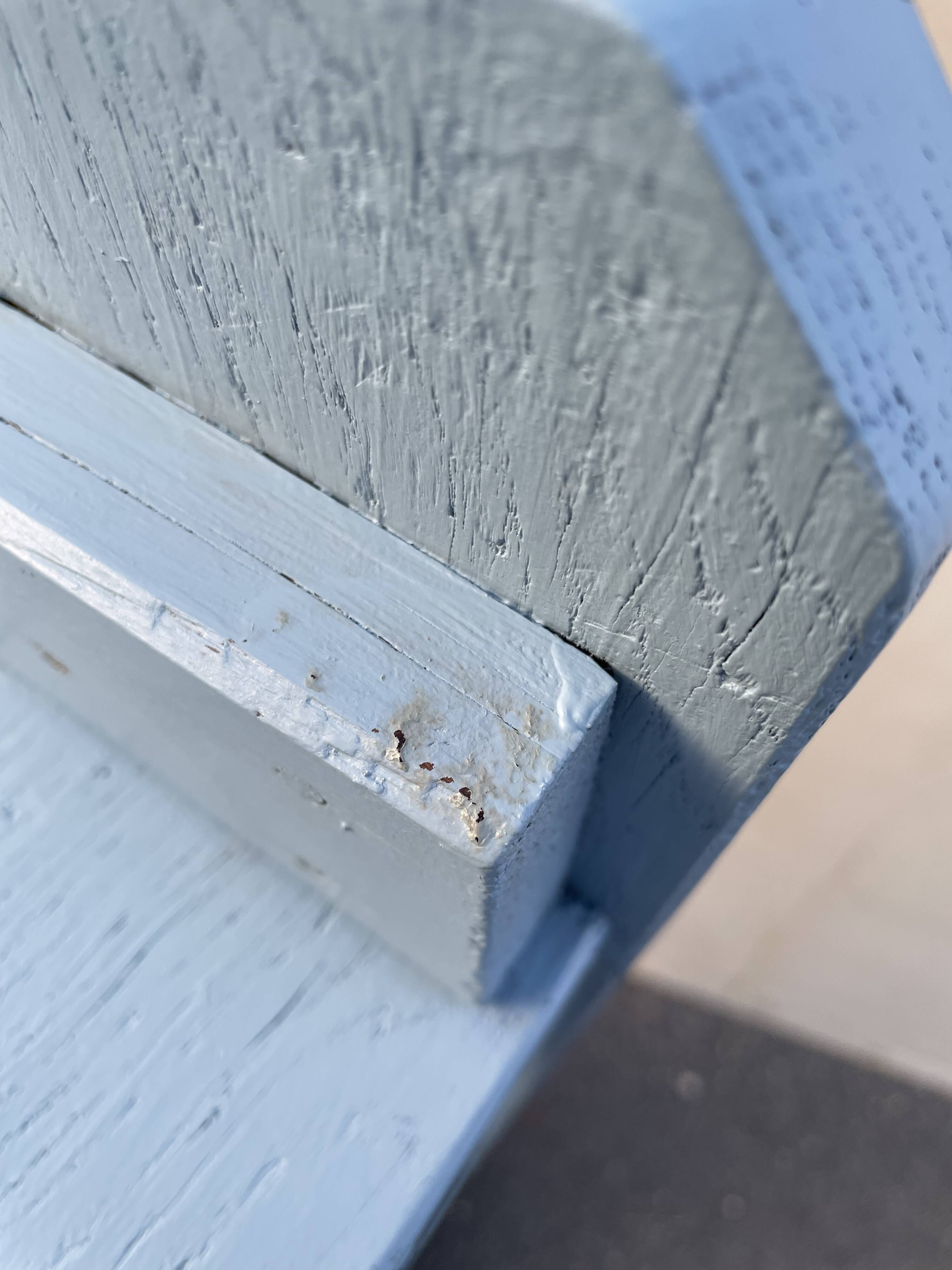 Blue painted wooden bench