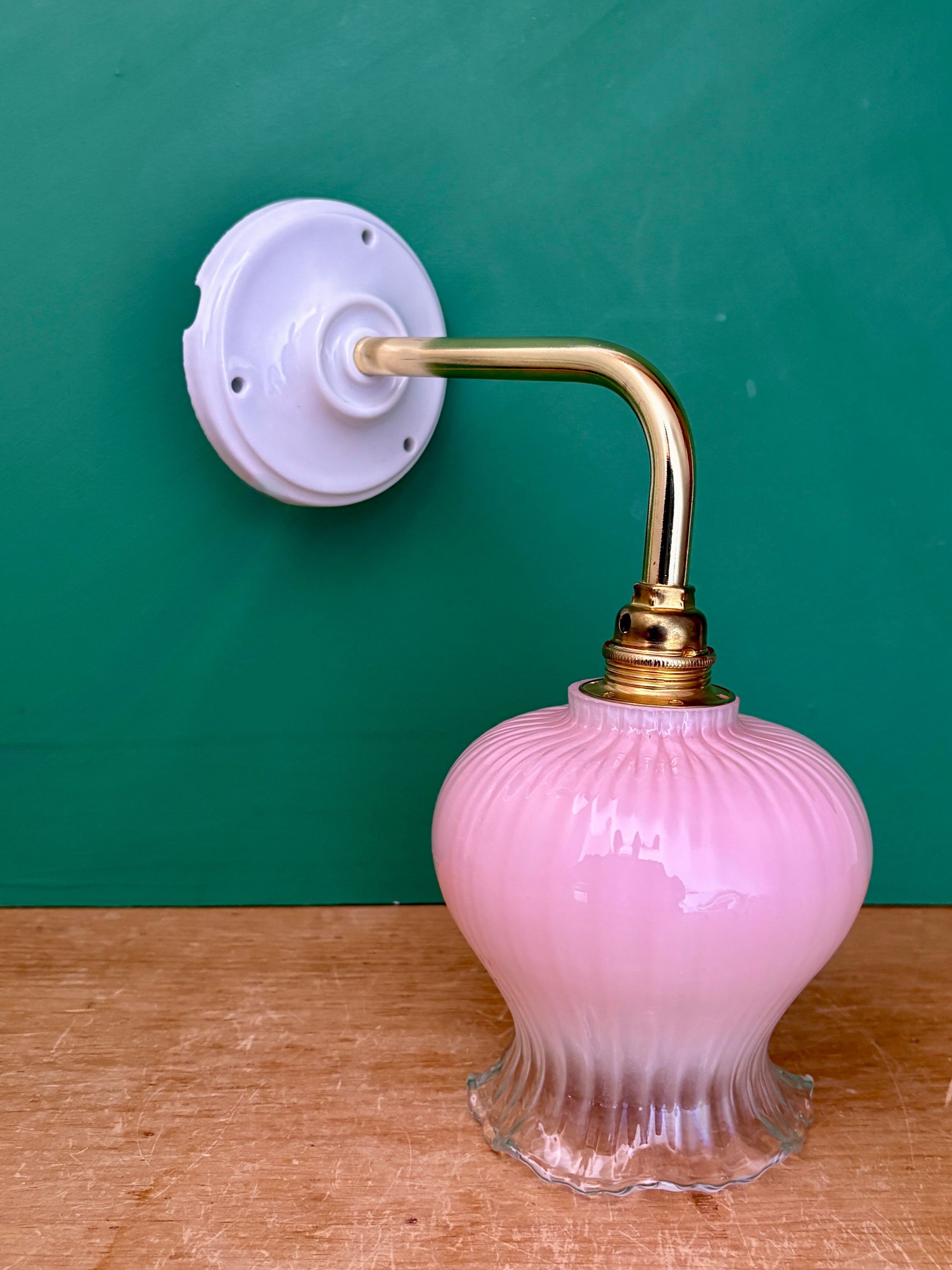 Vintage pink and clear glass elbow wall light.
