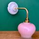 Vintage pink and clear glass elbow wall light.