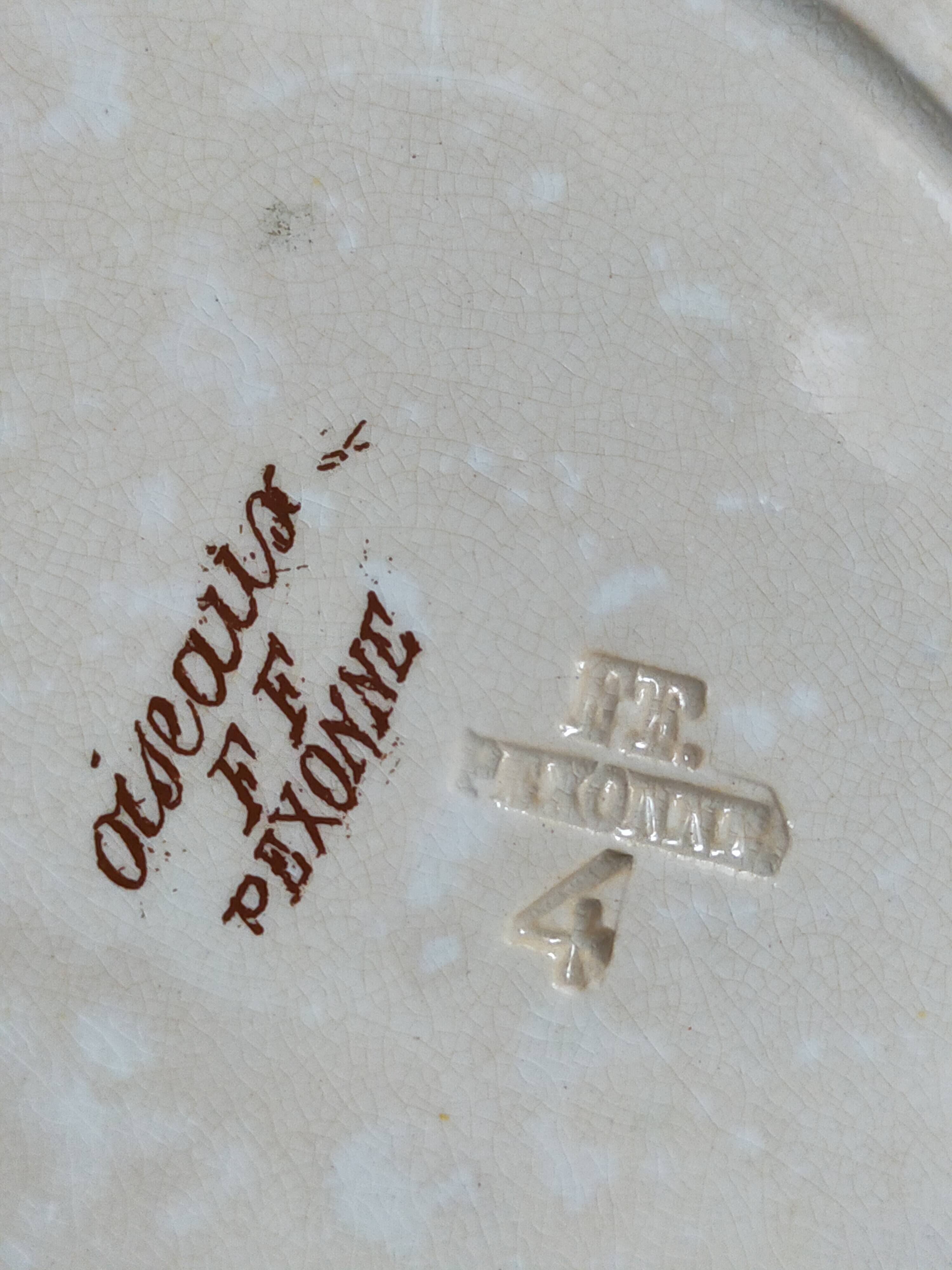 Seven iron earth dessert plates with birds ffPexonne late 19th century