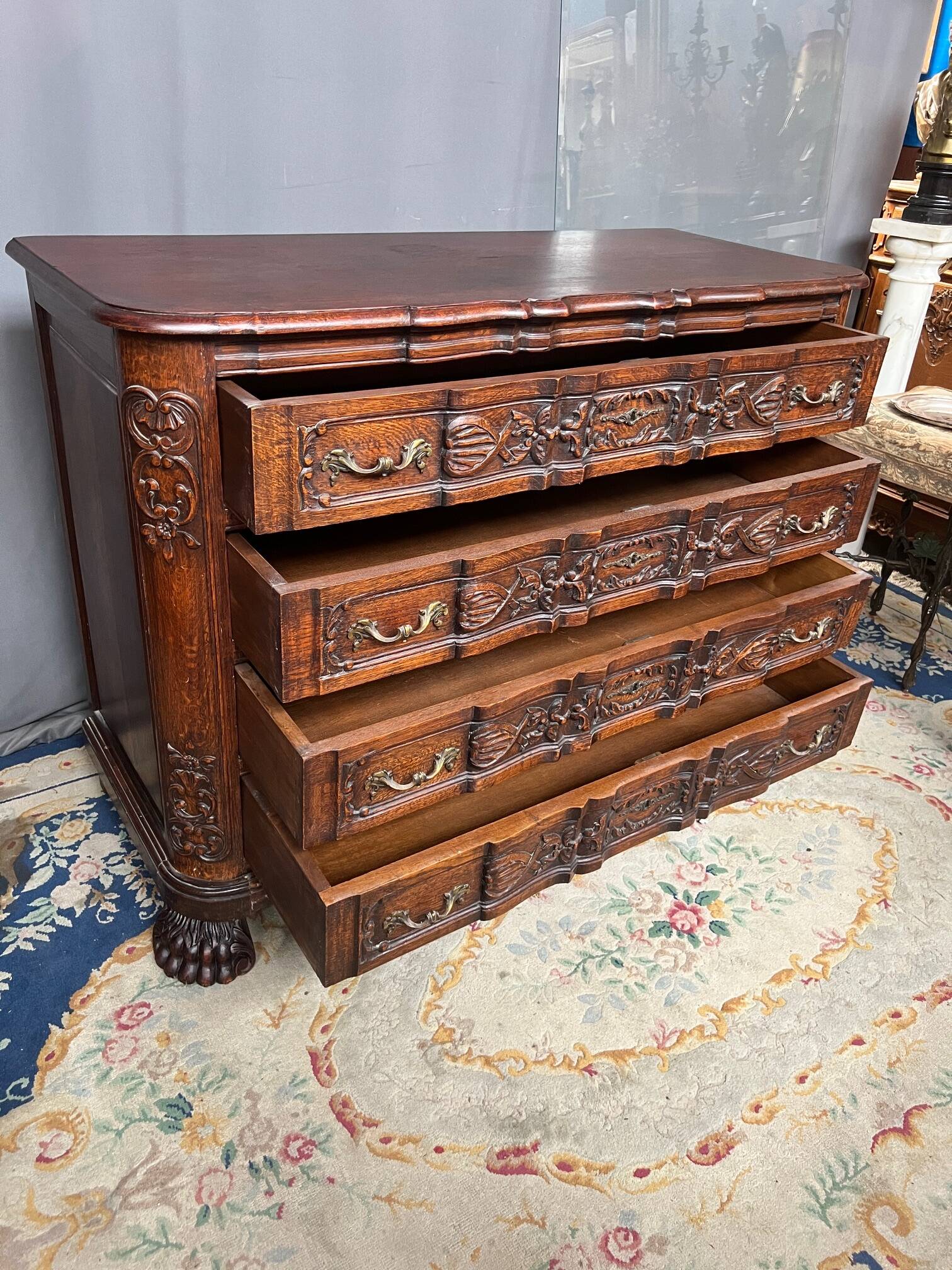 Luxurious carved Neo-Renaissance chest of drawers.