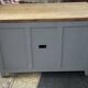Vintage sideboard painted in gray and raw wood