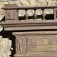 Imposing fireplace mirror in carved and painted wood, 19th century.