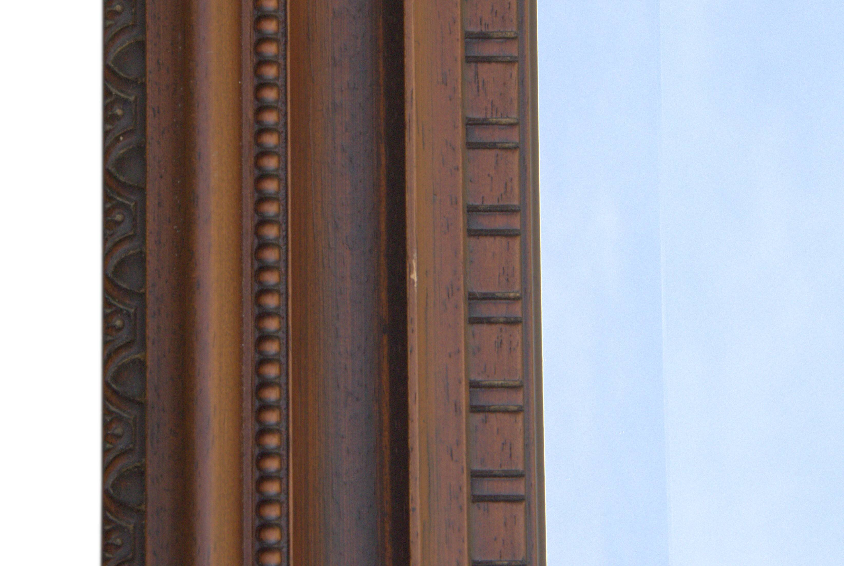 Vertical mirror, bevelled glass and carved wooden frame, 68x88cm