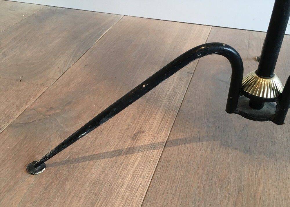 Floor lamp in black lacquered metal and brass