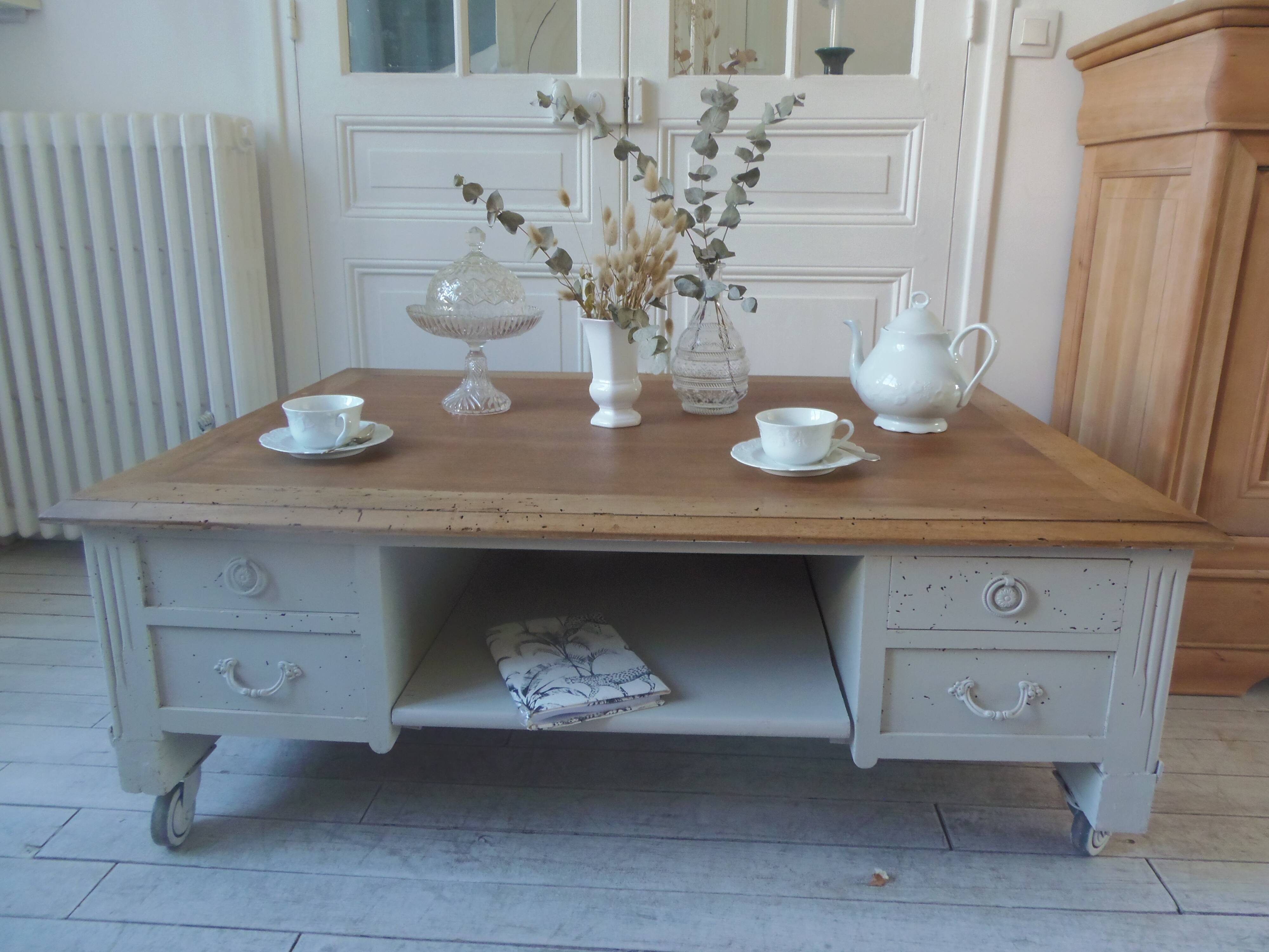 Coffee table on casters, made from an old desk, pearl gray base and belt.