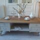 Coffee table on casters, made from an old desk, pearl gray base and belt.