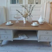 Coffee table on casters, made from an old desk, pearl gray base and belt.