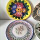 Set of four floral plates Longwy Toledo Talavera Sarreguemines LB