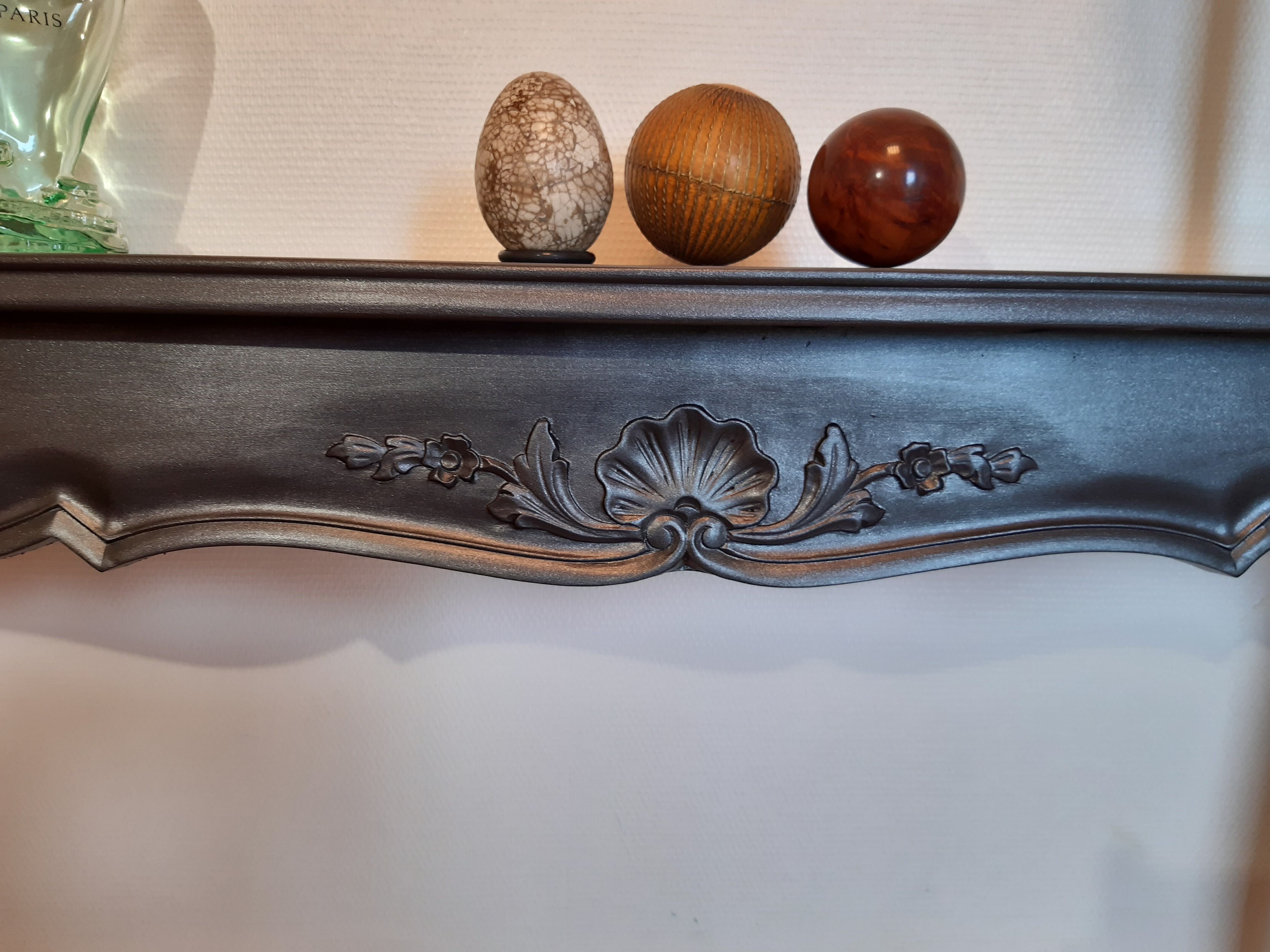 Louis XV-style black wall console