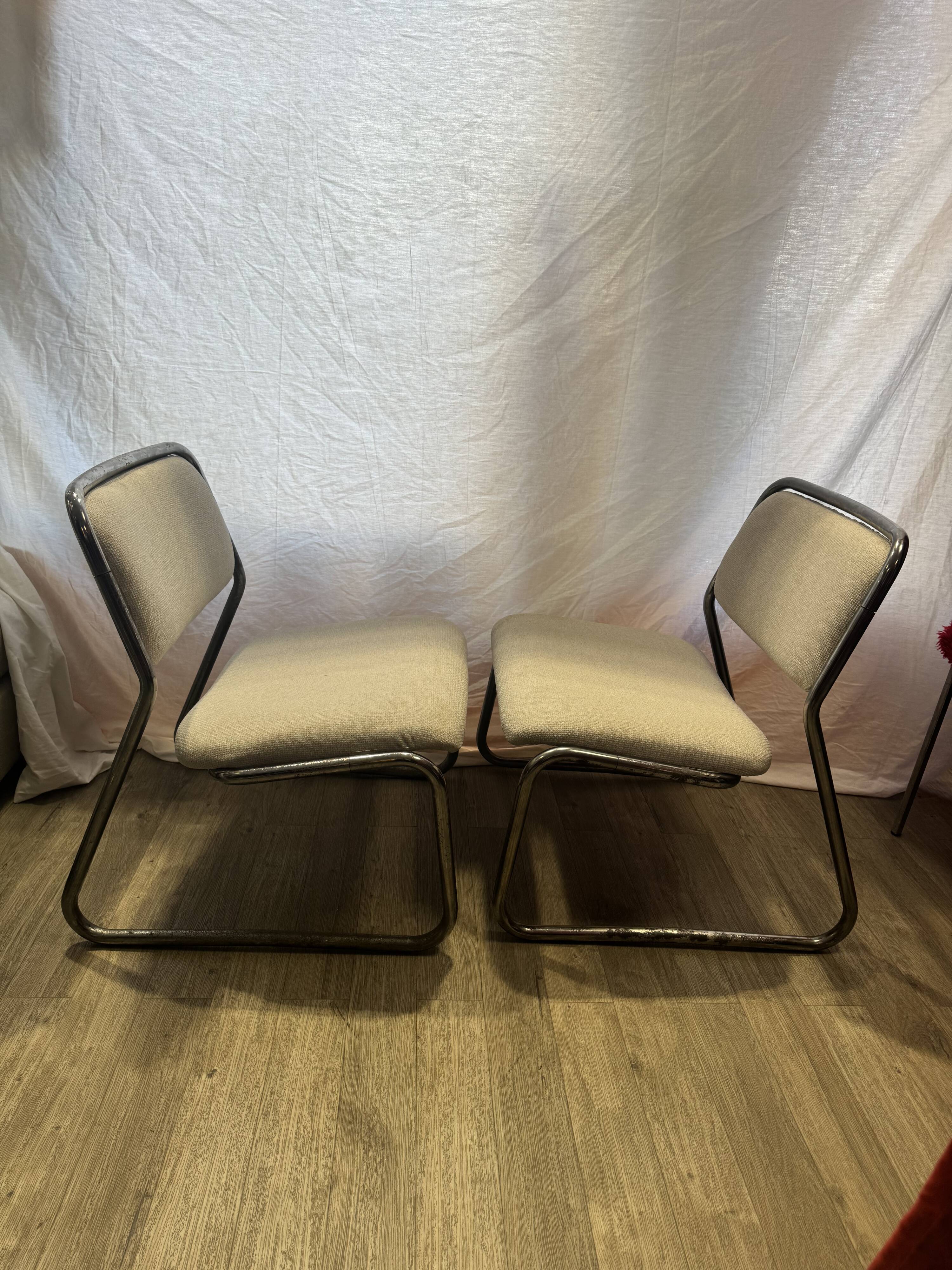 Pair of 70s tubular armchairs