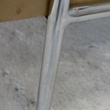 Tubular steel armchair and "cream" leather, France, circa 1970
