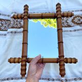 Antique mercury mirror in bamboo-style wood