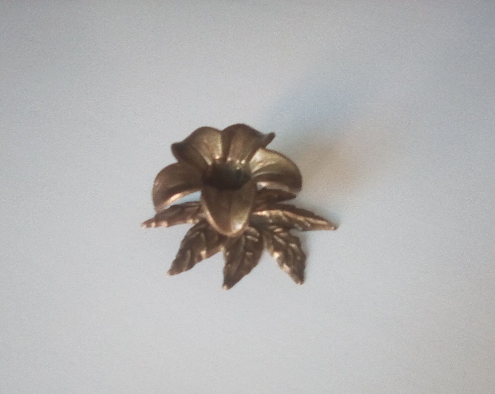 Vintage flower candlestick in chissed solid brass