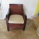 Vintage colonial-style armchair in woven rattan and exotic wood