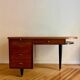 French desk "Prouve" in walnut, bronze and rubber from the 1970s.
