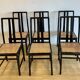 Set of 6 black lacquered and cane chairs by Montina s.p.a.