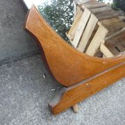 Round mirror on 60's furniture