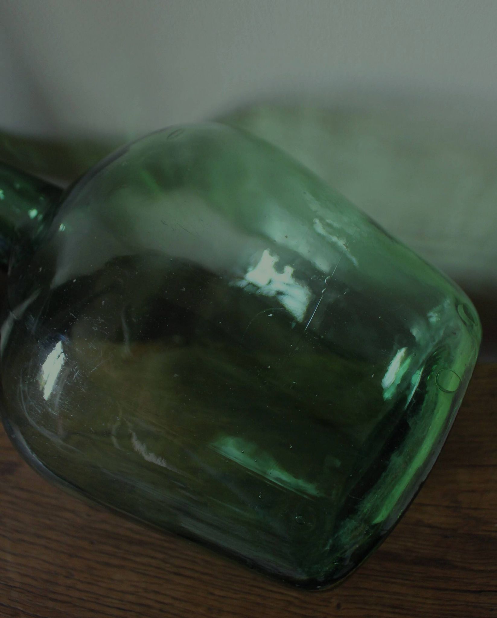 Give me a dark green glass Bonbonne jar.