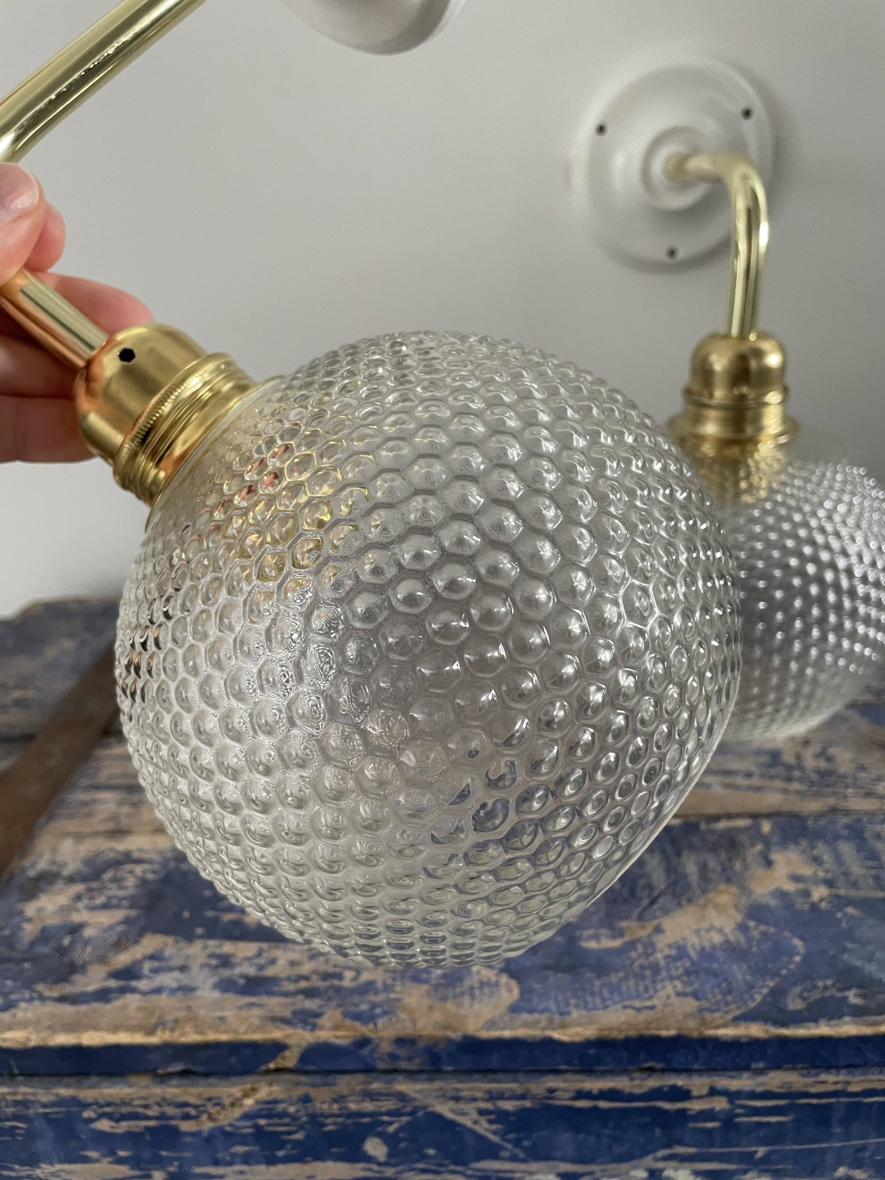 Pair of wall sconces glass globes