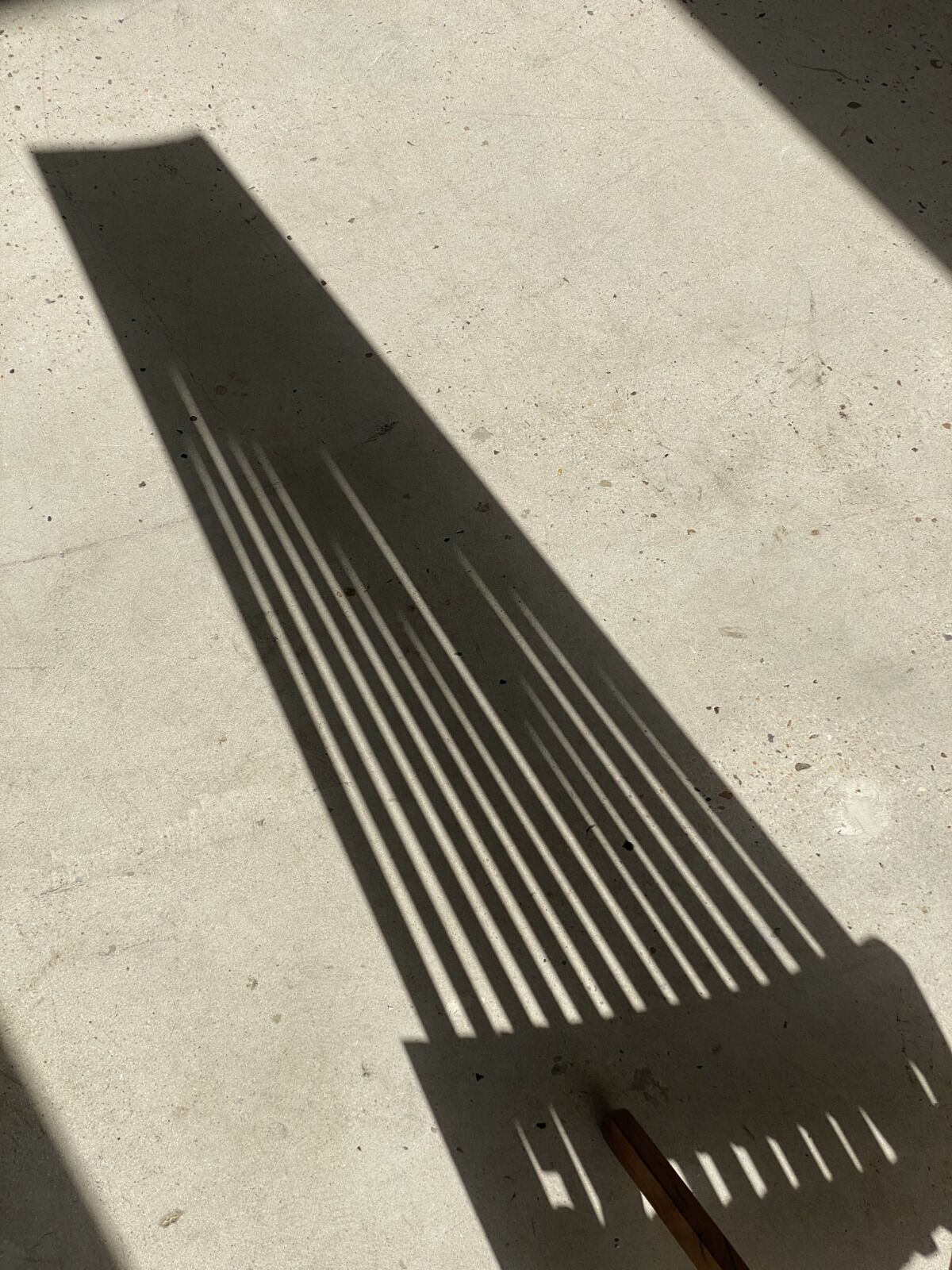 Foldable designer armchair in wooden slats