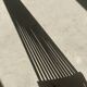 Foldable designer armchair in wooden slats