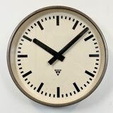 Brown industrial factory wall clock from Pragotron, 1960s